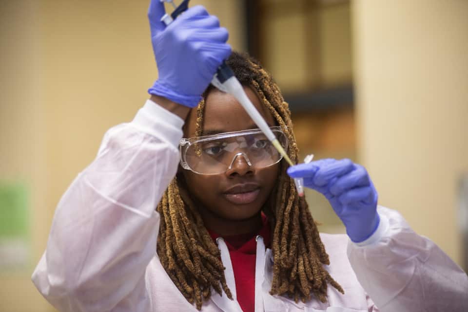 Student using micropipette